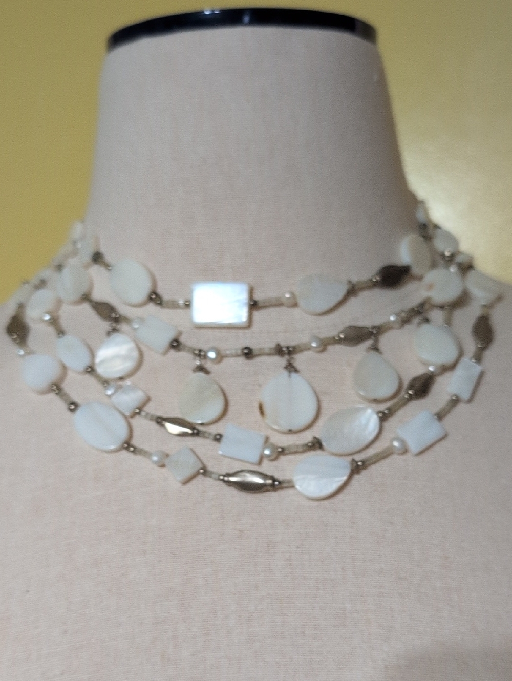Quadruple strand necklace